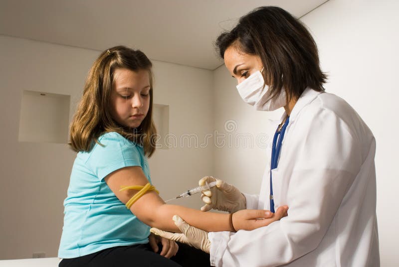 Doctor gives girl a shot in the arm-Horizontal