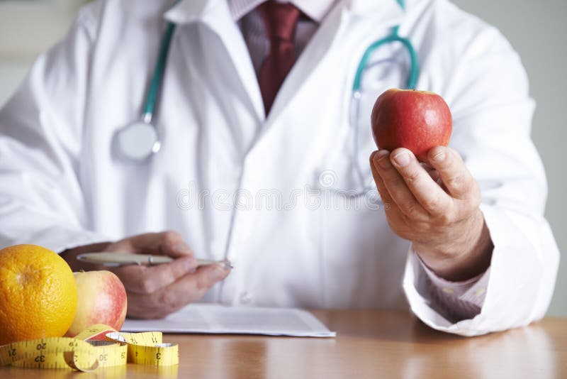 Close Up Di Medico, Che Danno Consigli Su Una Dieta Sana.