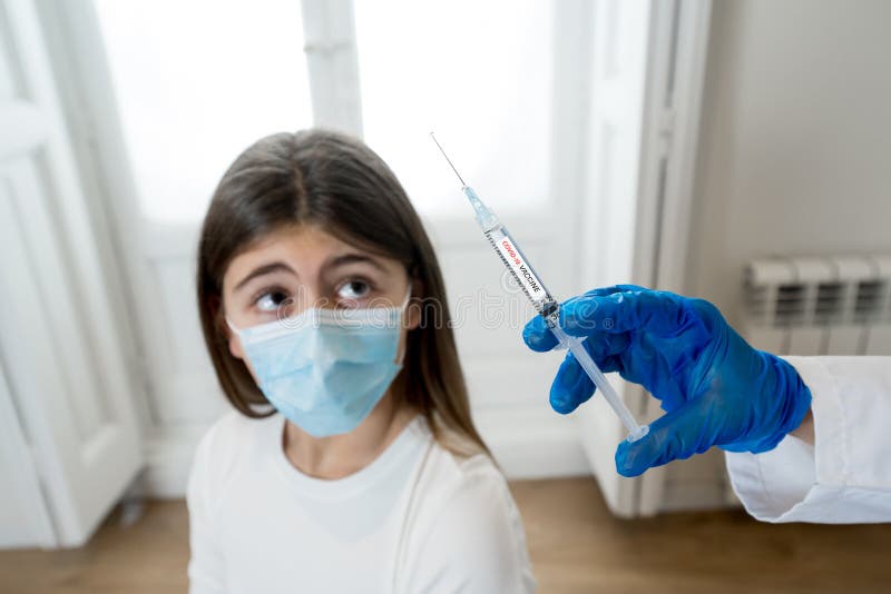 Doctor giving COVID-19 Vaccine to a patient at the clinic hospital. First safe and effective coronavirus Vaccine, human clinical t