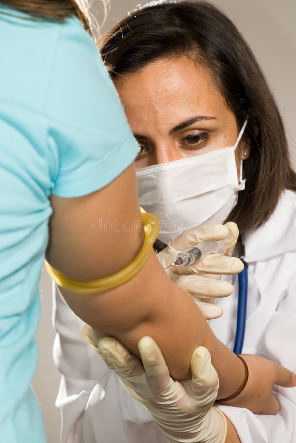 Doctor Giving a Shot in the Arm- Vertical