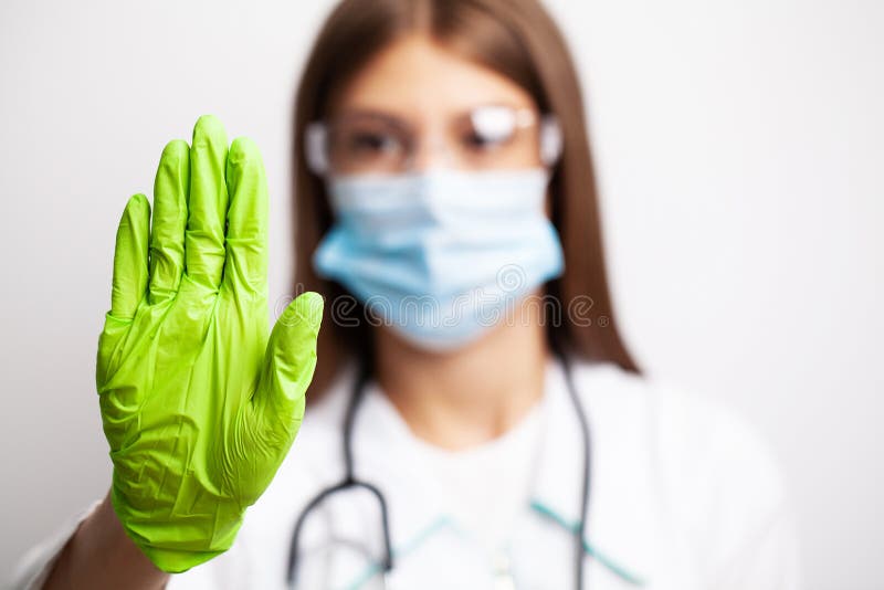 Doctor in Gloves and a Mask Shows a Stop with His Hands Stock Photo ...