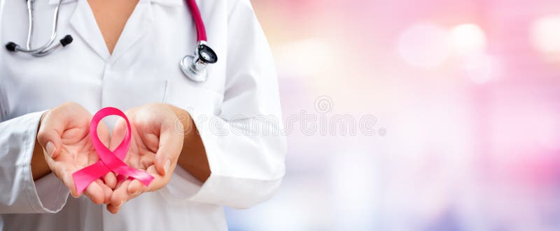 Doctor Hands Holding Pink Cancer Awareness Ribbon