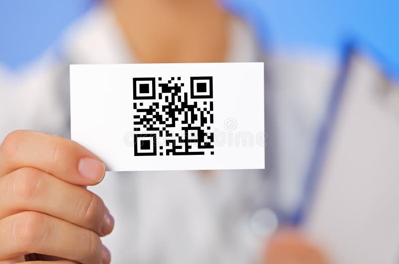 Doctor holding business card with QR code