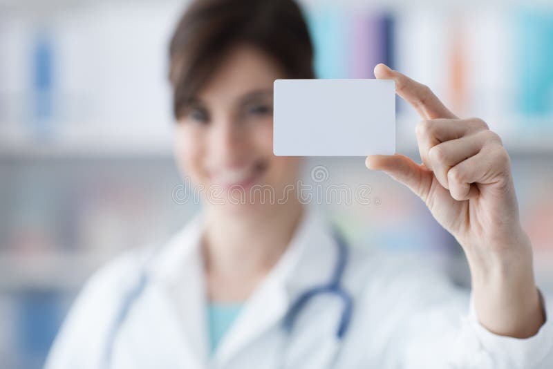Doctor holding a business card