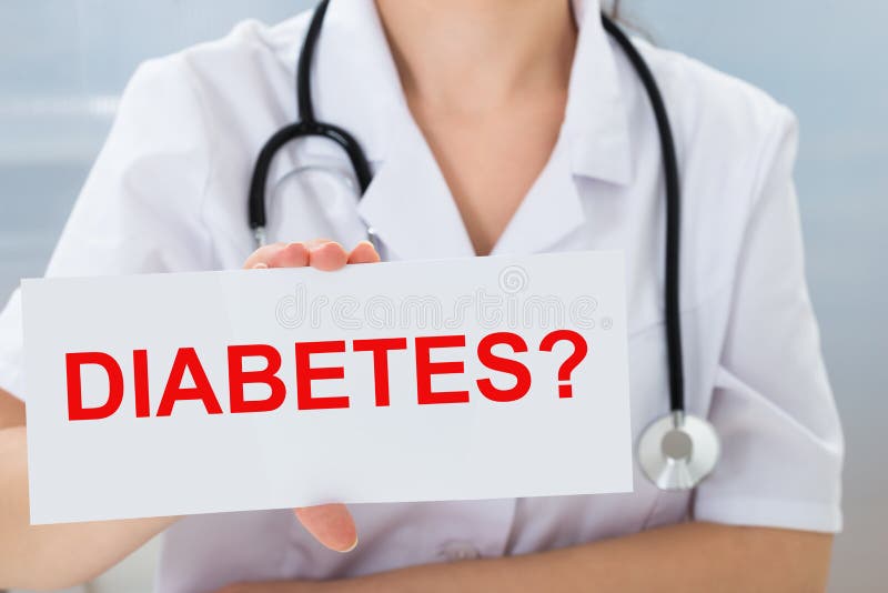 Doctor holding placard with diabetes text