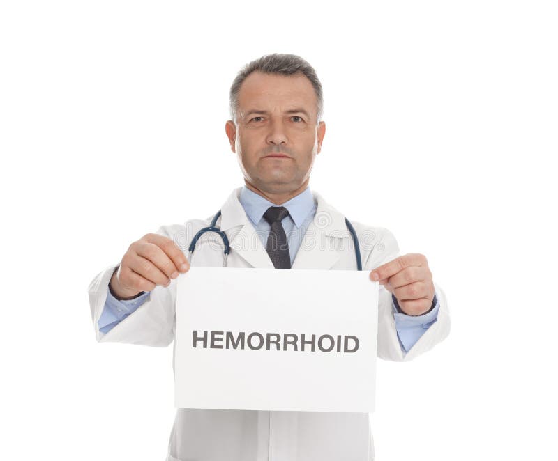 Doctor holding sign with word HEMORRHOID