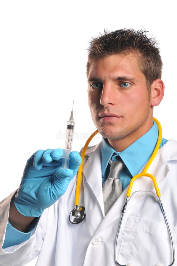 Doctor holding syringe stock image. Image of portrait 12876427