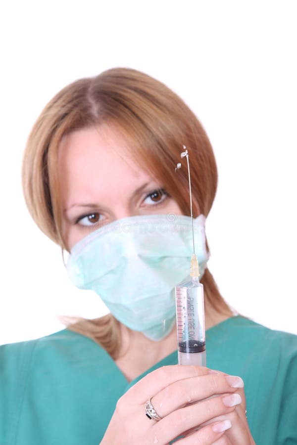 Doctor holding syringe stock photo. Image of disposable 13413118