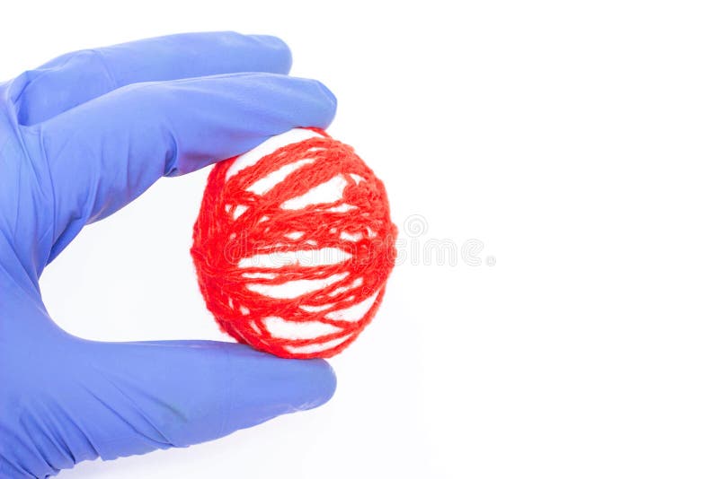 Doctor holds an egg with red threads in a medical glove the concept of male disease varicocele and varicose veins, copy space, inflammation, orchitis