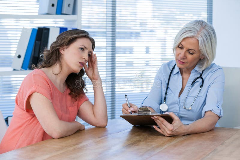 Doctor interacting with patient royalty free stock image Doctor interacting with patient royalty free stock image