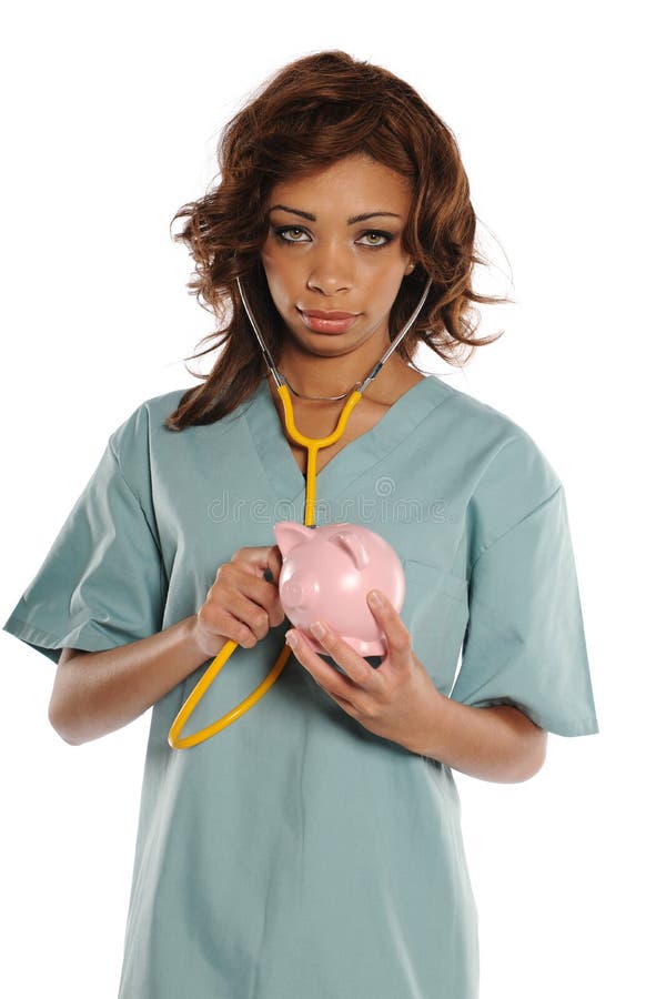 Doctor joven del afroamericano que sostiene una batería guarra imagen de archivo libre de regalías Doctor joven del afroamericano que sostiene una batería guarra imagen de archivo libre de regalías