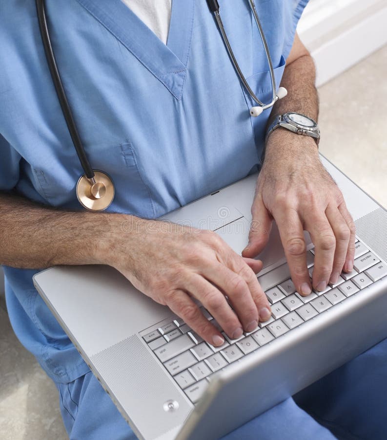 Doctor at Laptop Closeup royalty free stock images Doctor at Laptop Closeup royalty free stock images