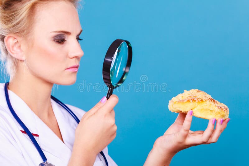 Doctor With Magnifying Glass Examining Sweet Food Stock Image Image 