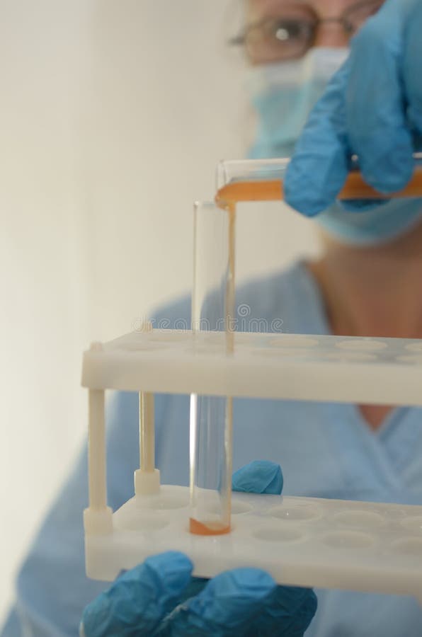 The Doctor Makes Tests with a Biological Fluid. Stock Image Image of