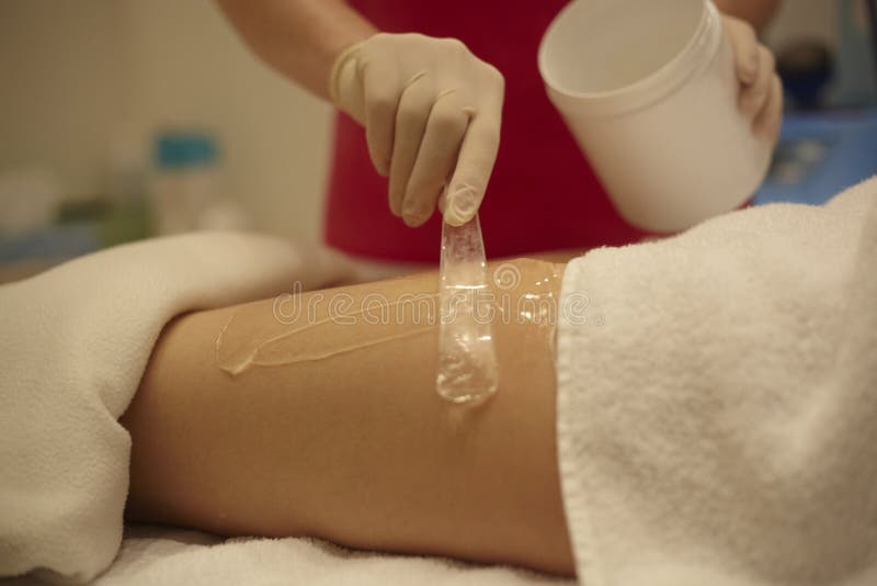 Doctor on a medical procedure - cellulite theraphy