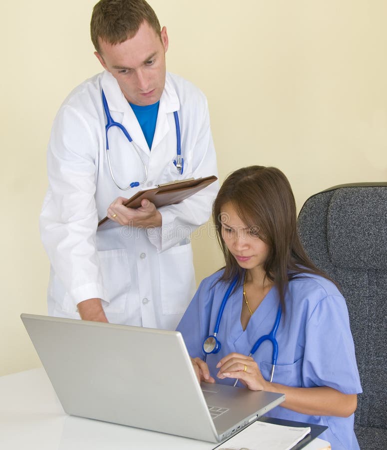 Doctor and Nurse stock photo. Image of male, confident 5405478
