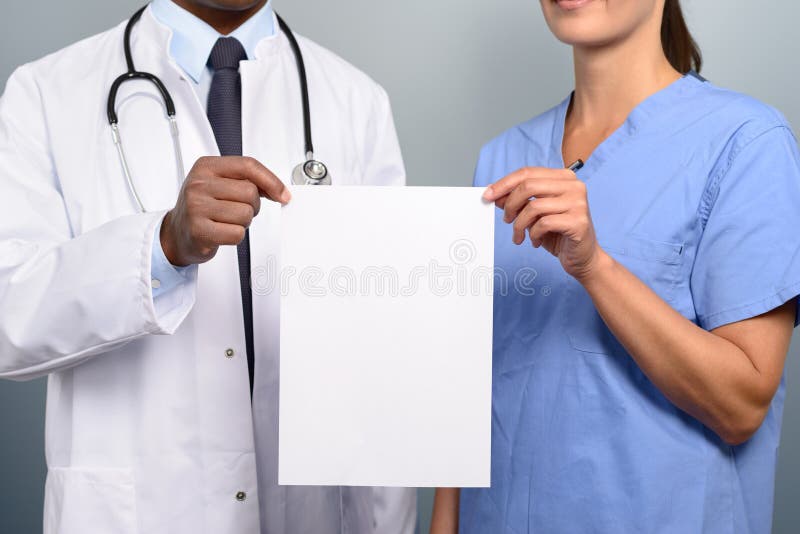 Doctor and nurse holding up a blank white sign