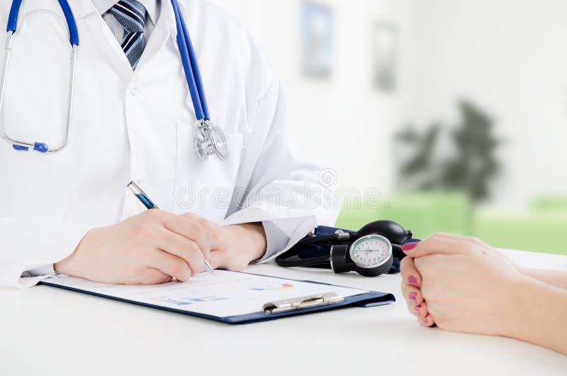 Doctor and patient medical consultation stock photography