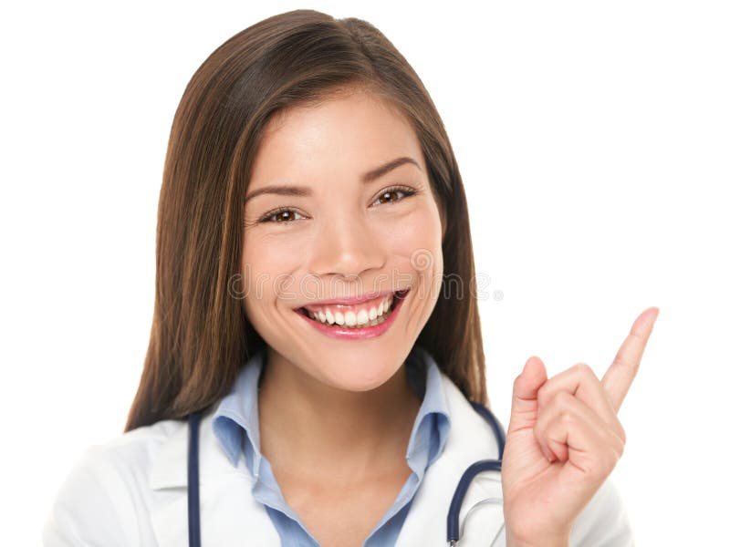 Doctor pointing. Female medical professional nurse or doctor showing copy space isolated on white background. Beautiful young Mixed race Asian / Caucasian woman model. Doctor pointing. Female medical professional nurse or doctor showing copy space isolated on white background. Beautiful young Mixed race Asian / Caucasian woman model.