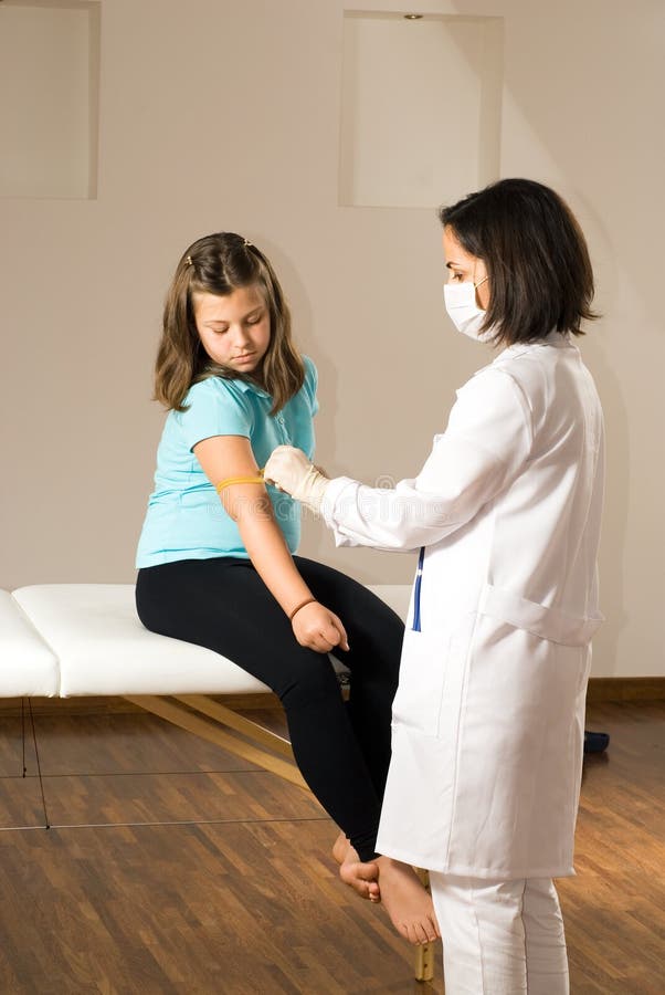 Doctor Prepares Young Patient s Arm-Vertical