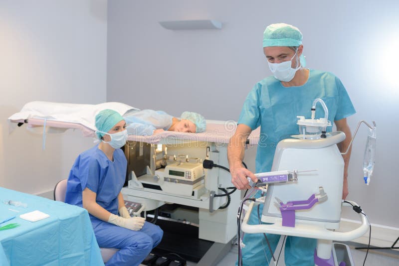 Doctor Preparing Equipment for Medical Procedure Stock Image Image of healthcare, stretcher
