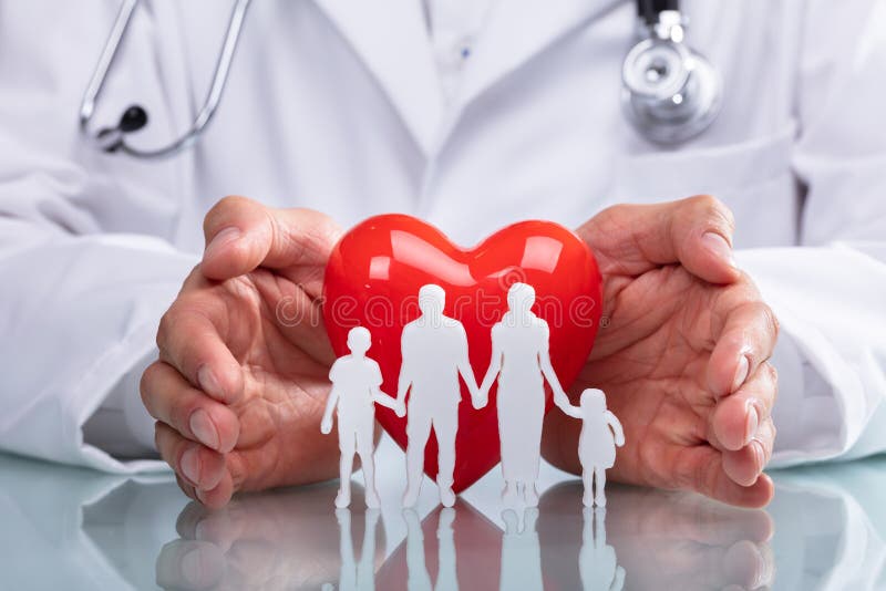 Doctor Protecting Red Heart With Family Figure