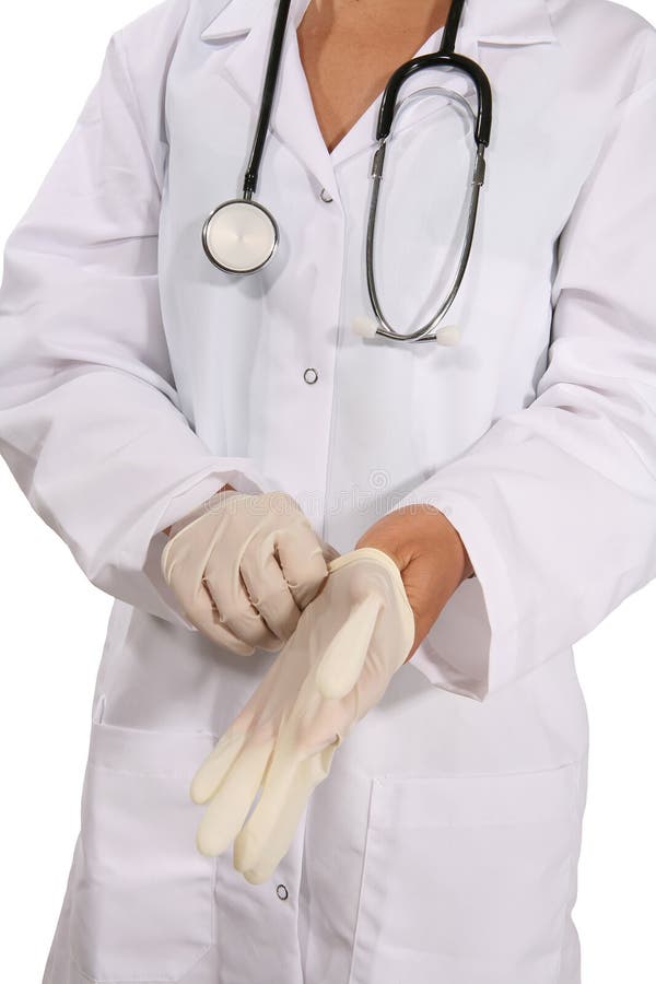 Doctor putting on gloves stock photo. Image of exam, sterile 974724