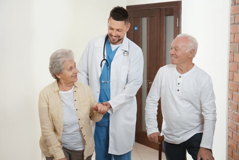 Doctor with Senior Patients at Hospital Stock Image Image of