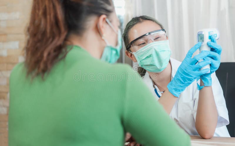 Doctor and senior woman wearing facemasks during coronavirus and flu outbreak. Virus and illness protection, home quarantine. royalty free stock images Doctor and senior woman wearing facemasks during coronavirus and flu outbreak. Virus and illness protection, home quarantine. royalty free stock images