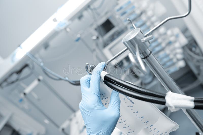 Doctor Sets Equipment in the ICU Stock Image Image of practitioner