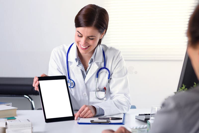 Doctor showing tablet to patient royalty free stock photos Doctor showing tablet to patient royalty free stock photos
