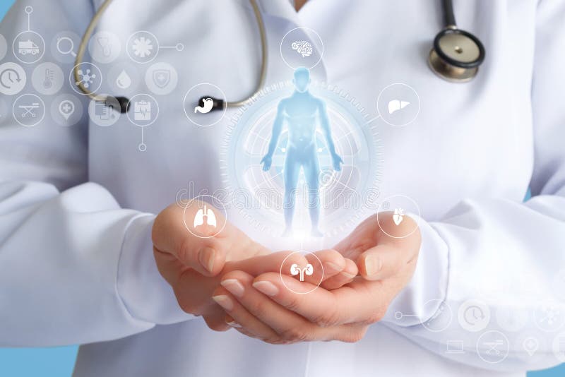 Doctor shows a hologram of a patient. stock images