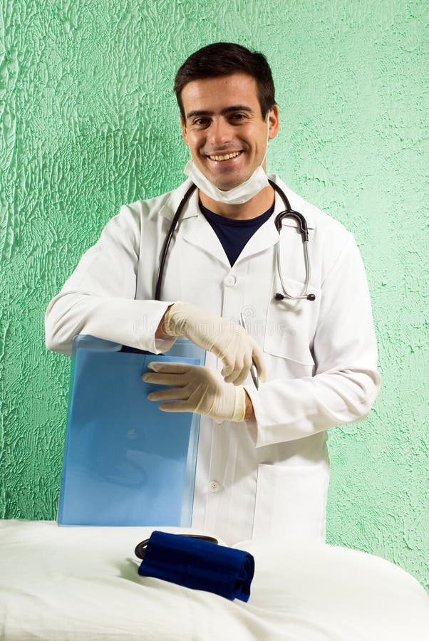 Doctor Standing in Doctors Office - Vertical