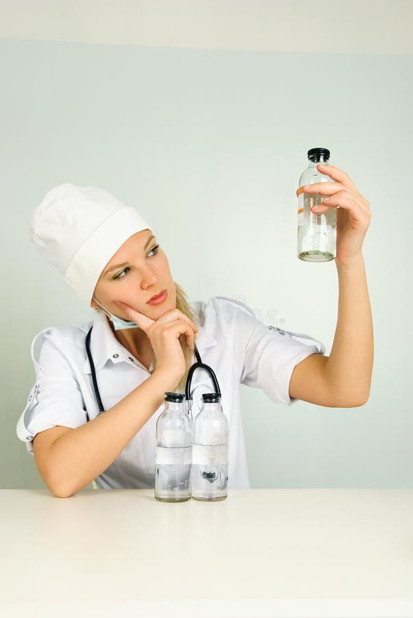 Doctor with a stethoscope and medications