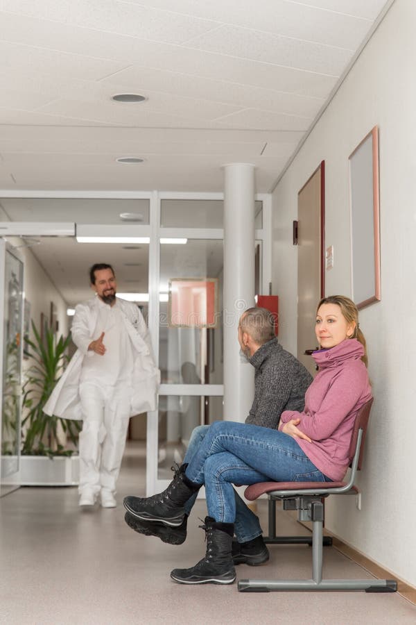Doctor or surgeon is giving a woman a handshake royalty free stock image Doctor or surgeon is giving a woman a handshake royalty free stock image
