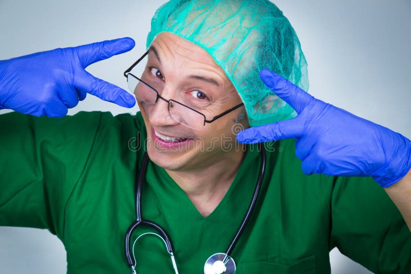 Doctor surgeon showing scissors