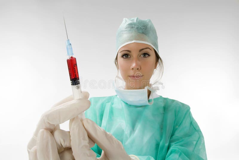 The doctor and the syringe stock photo. Image of injection 4774302