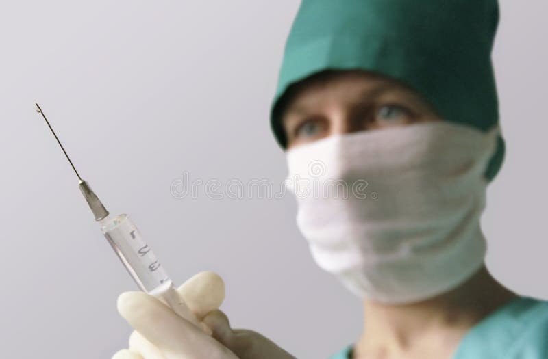 Doctor and syringe