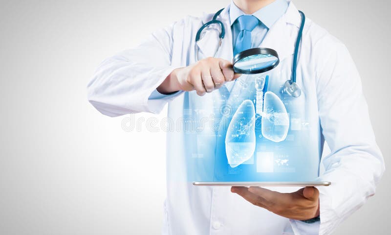 Doctor with tablet pc stock images