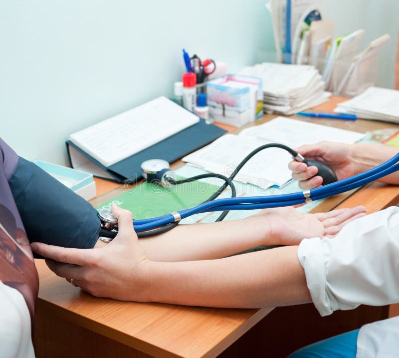 Doctor Takes Blood Pressure Stock Photo Image of care, medic 25933818