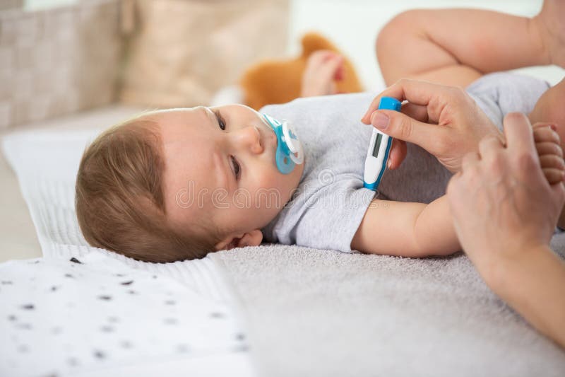 Doctor Taking Babys Temperature Stock Photo Image of childhood, child