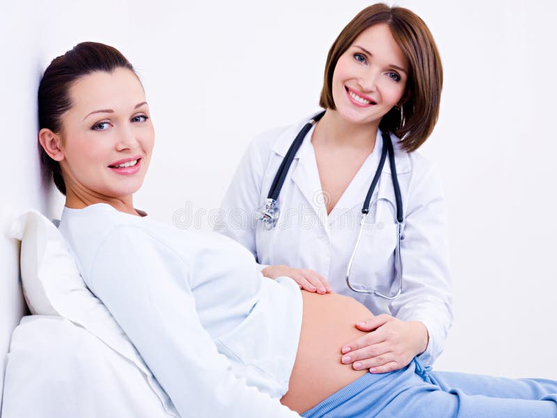 Doctor touches the belly s pregnant