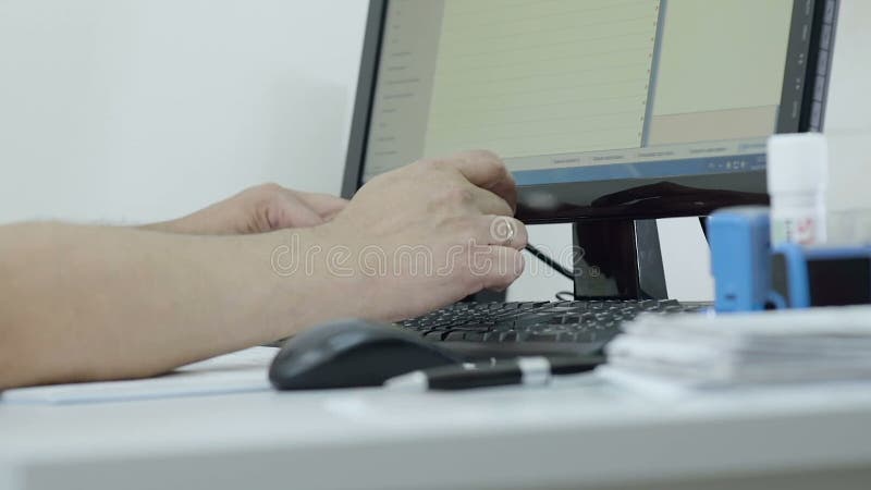 Doctor Typing Data On Keyboard stock video