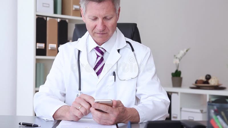 Doctor is using smart phone