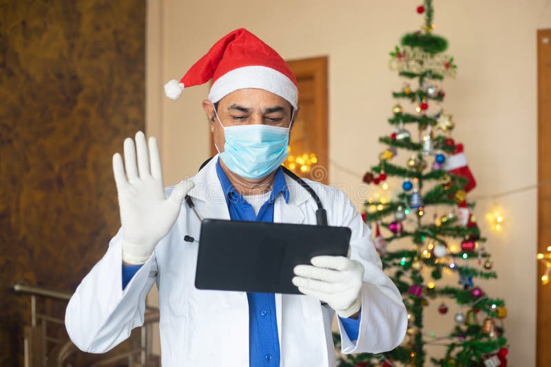 Doctor Wearing Mask And Santa Hat Open Christmas Gift Box ...