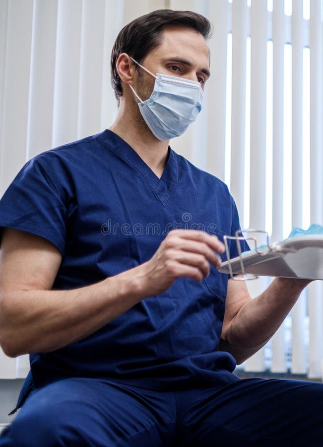 Doctor Wearing Protective Mask in a Hospital Stock Photo Image of