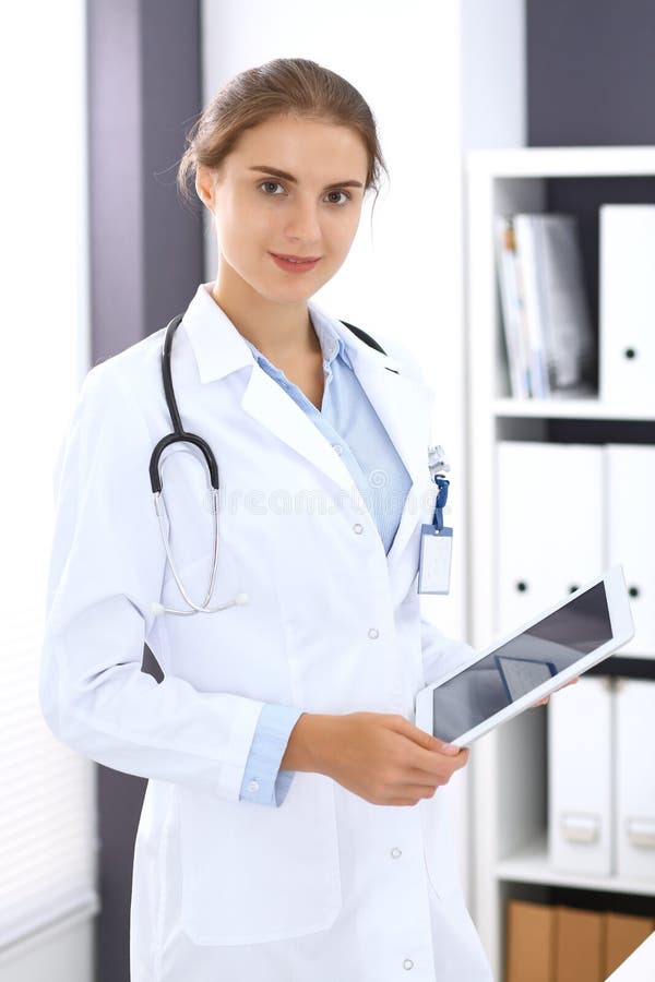 Doctor Woman In Clinic Office Female Physician At Work Using Digital