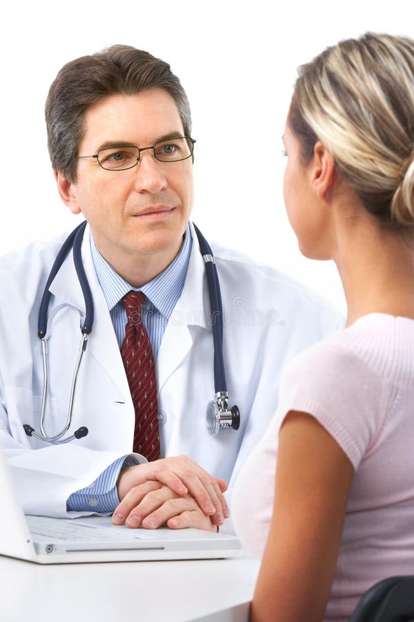 Doctor and woman patient stock photos