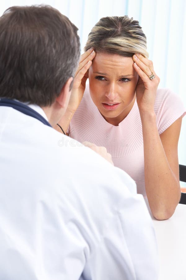 Doctor and woman patient royalty free stock images