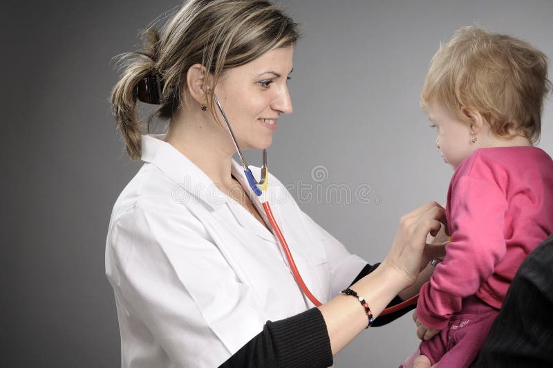 Doctor working with baby girl